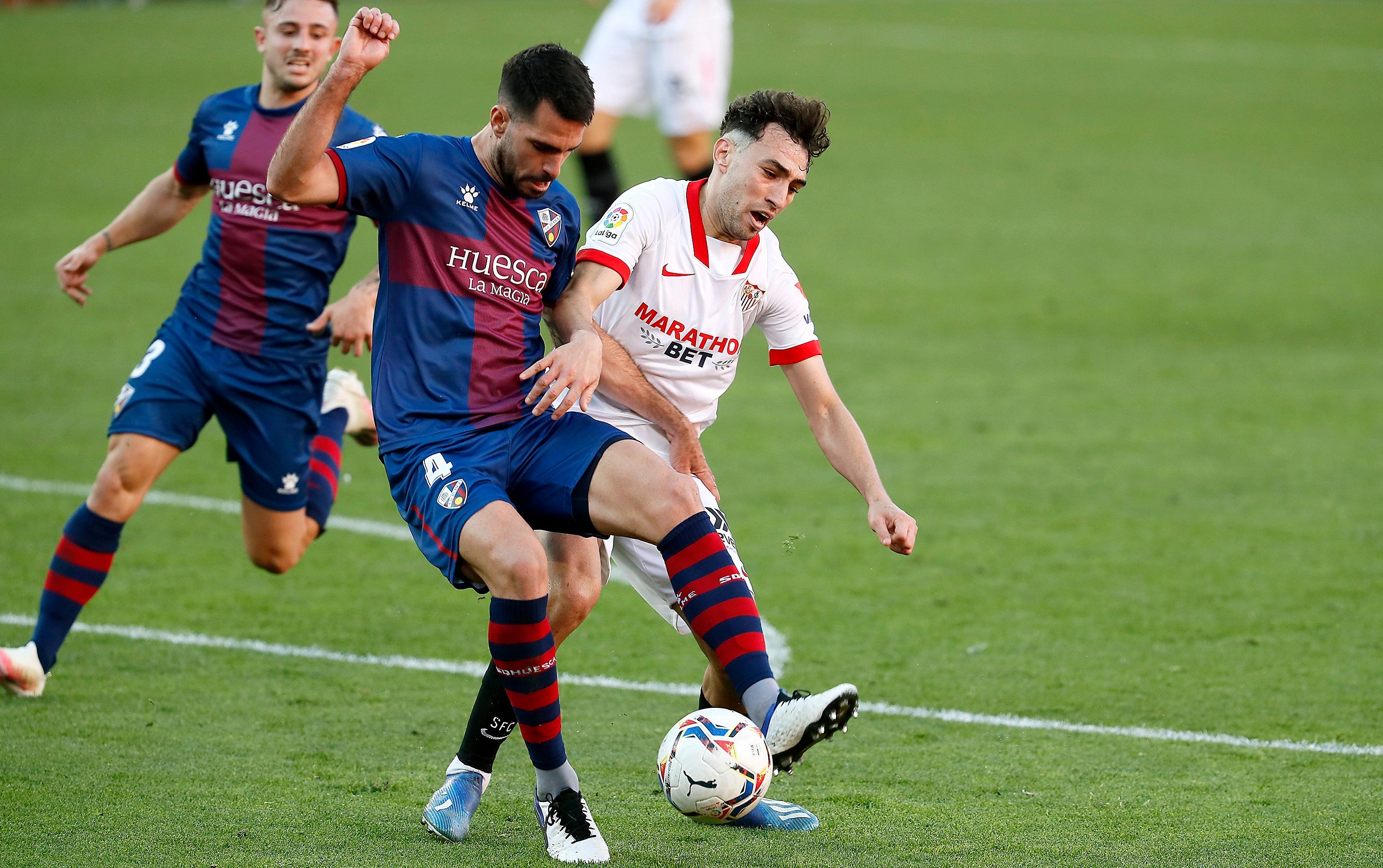 Munir marca y Bono sostiene al Sevilla en el triunfo por la mínima ante el Huesca Munir marca y Bono sostiene al Sevilla en el triunfo por la mínima ante el Huesca