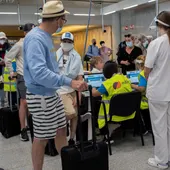 Turistas en el aeropuerto Turistas en el aeropuerto