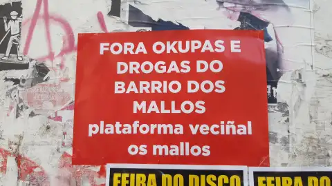 Pancarta y pintadas en el barrio de los Mallos en A coruña en contra de los okupas Pancarta y pintadas en el barrio de los Mallos en A Coruña en contra de los okupas