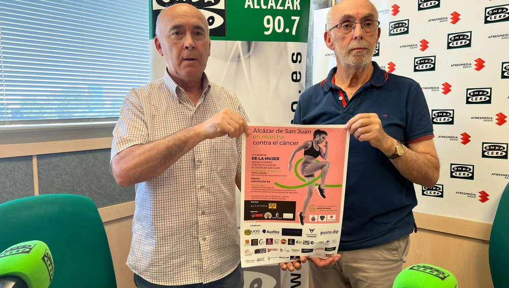 Lubián y Sánchez con el cartel del evento