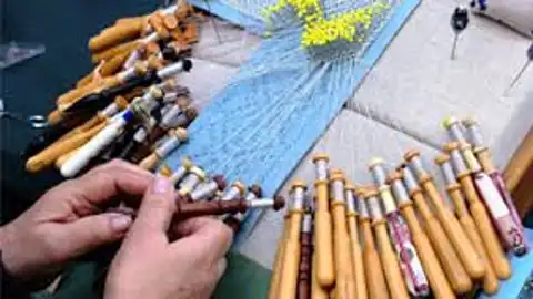 Encaje de bolillos. Encaje de bolillos.