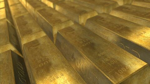 Imagen de archivo que muestra varios lingotes de oro/ Pixabay