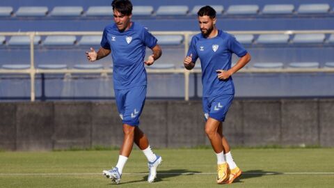 Alberto Escassi y Luis Mu&ntilde;oz, en un entrenamiento del M&aacute;laga CF