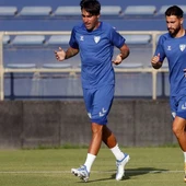 Alberto Escassi y Luis Muñoz, en un entrenamiento del Málaga CF Alberto Escassi y Luis Muñoz, en un entrenamiento del Málaga CF