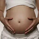 Foto de archivo de una mujer embarazada Foto de archivo de una mujer embarazada