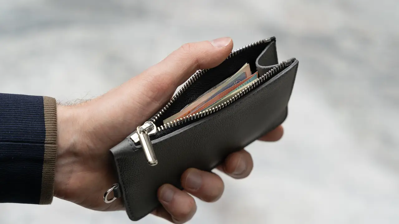 Una cartera con dinero/Imagen de archivo Una cartera con dinero/Imagen de archivo