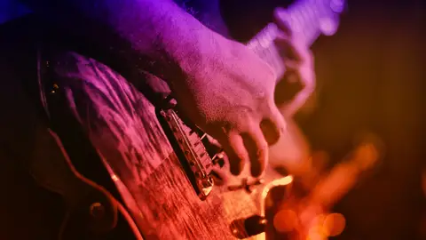 Imagen de archivo de una guitarra Imagen de archivo de una guitarra