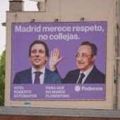 Podemos coloca una lona en Ventas con la imagen de Florentino Pérez pegando una colleja a Almeida
