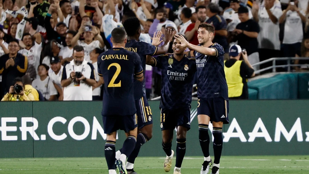 Real Madrid midfielder Federico Valverde (R) reacts after scoring during the second half of the friendly match between Real Madrid and AC Milan at Rose Bowl Stadium in Pasadena, California, USA, 23 July 2023
