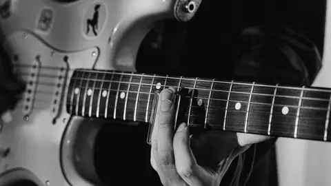 Imagen de archivo de una guitarra Imagen de archivo de una guitarra