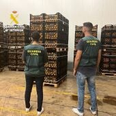 Dos detenidos por robar en un almacén 25 toneladas de naranjas