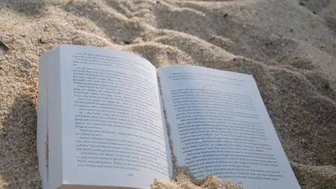 Lectura en la playa Lectura en la playa