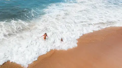 Baño en la playa Baño en la playa