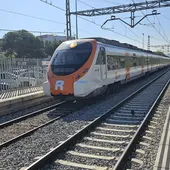 Tren de Rodalies en la estación de Mollet Tren de Rodalies en la estación de Mollet