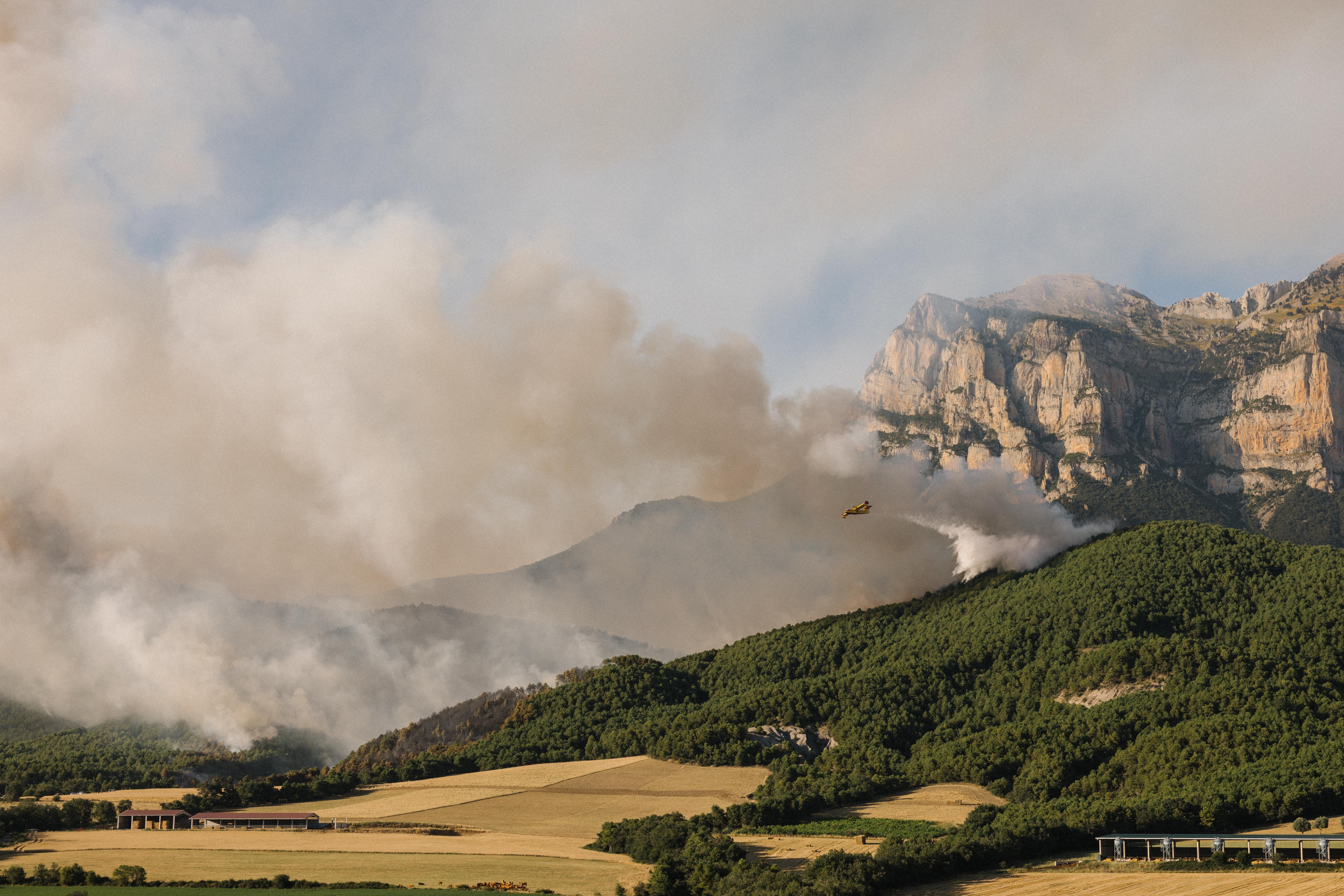 Vuelven a sus casas los vecinos evacuados por el incendio de El Pueyo de Araguás Vuelven a sus casas los vecinos evacuados por el incendio de El Pueyo de Araguás