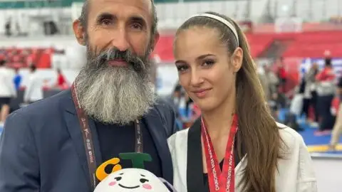 Violeta Díaz junto a su preparador Violeta Díaz junto a su preparador