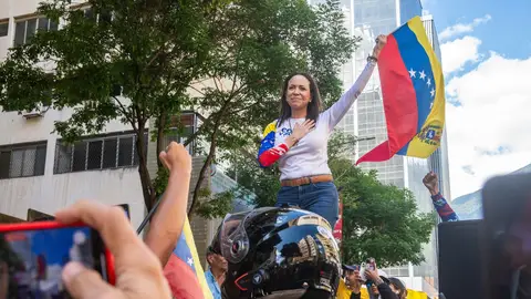 La líder antichavista, María Corina Machado, durante la manifestación en Caracas (Venezuela) El Gobierno de Venezuela acusa a Machado de orquestar una operación de "falso positivo" con su detención