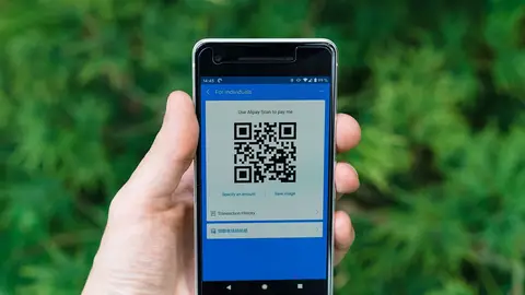 Imagen que ilustra un código QR para escanear en un teléfono. Imagen que ilustra un código QR para escanear en un teléfono.