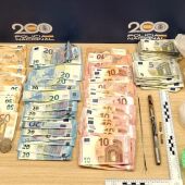 Dinero y material intervenidos por la Policía Nacional