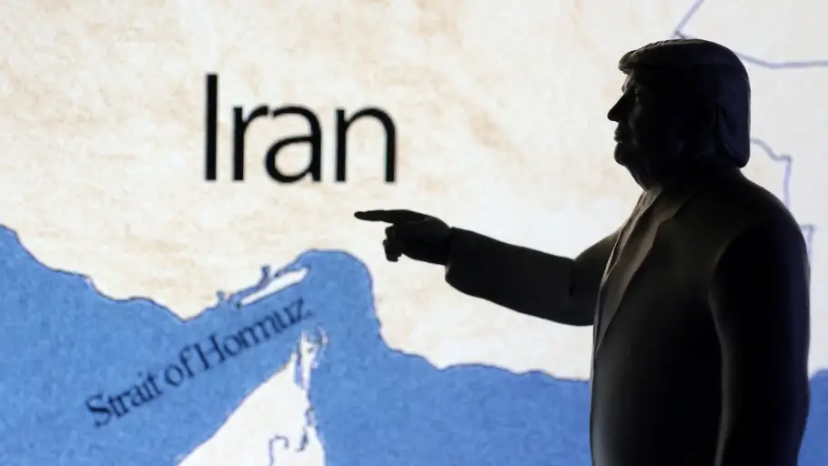 A map showing the Strait of Hormuz and Iran is seen behind a 3D printed miniature of U.S. President Donald Trump A map showing the Strait of Hormuz and Iran is seen behind a 3D printed miniature of U.S. President Donald Trump