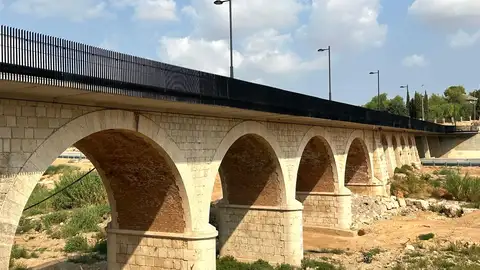 Puente histórico sobre el Barranco del Poyo entre Torrent y Alaquàs después de ser reconstruido tras el paso de la DANA de València Puente histórico sobre el Barranco del Poyo entre Torrent y Alaquàs después de ser reconstruido tras el paso de la DANA de València