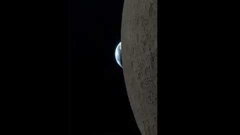 Captura del vídeo de la puesta de la Tierra desde la Luna, grabado durante la misión Artemis II. Captura del vídeo de la puesta de la Tierra desde la Luna, grabado durante la misión Artemis II.