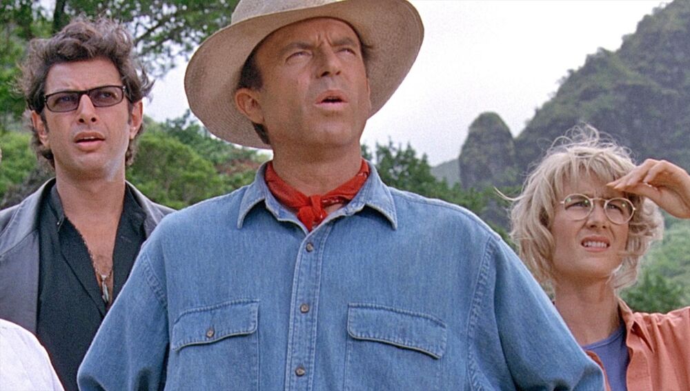 Sam Neill, Laura Dern y Jeff Goldblum en la primera entrega de Jurassic Park/ Universal Pictures/ Europa Press