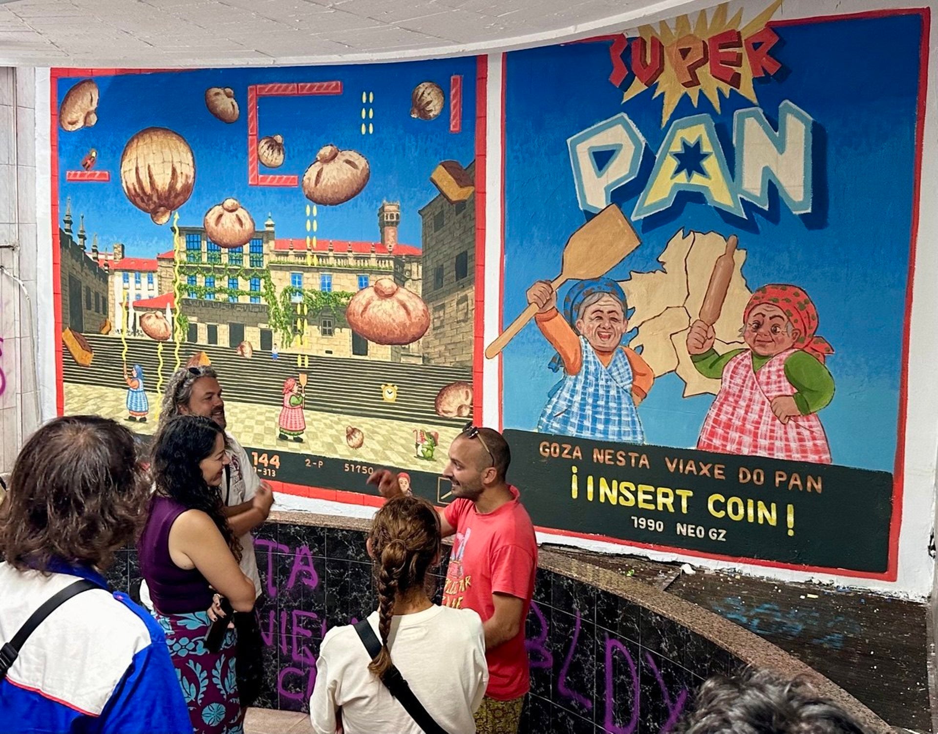 Ocho muralistas gallegos convierten unas galerías del Ensanche de Santiago en un museo de arte urbano Ocho muralistas gallegos convierten unas galerías del Ensanche de Santiago en un museo de arte urbano