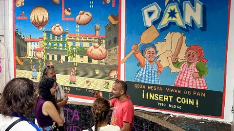 Ocho muralistas gallegos convierten unas galerías del Ensanche de Santiago en un museo de arte urbano Ocho muralistas gallegos convierten unas galerías del Ensanche de Santiago en un museo de arte urbano