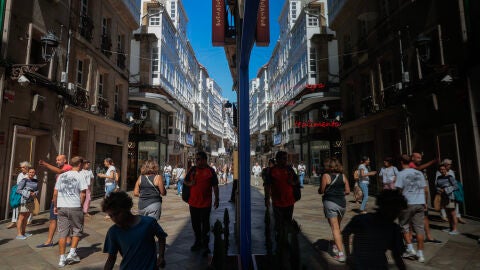 Shoppers move along Rua Real on August 10, 2026 ahead of the August 12th total solar eclipse in A Coruna, Spain.