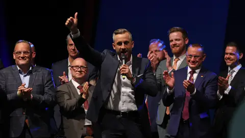 Ulrich Siegmund (C), lead candidate of the far-right Alternative for Germany (AfD), gestures on stage as AfD co-leader Tino Chrupalla (2nd from R) and AfD Saxony-Anhalt Chairman Martin Reichardt (L) look on at the AfD election evening watch party after initial results give the party 44.8% of the vote in Saxony-Anhalt state elections on September 6, 2026 in Magdeburg, Germany. Ulrich Siegmund (C), lead candidate of the far-right Alternative for Germany (AfD), gestures on stage as AfD co-leader Tino Chrupalla (2nd from R) and AfD Saxony-Anhalt Chairman Martin Reichardt (L) look on at the AfD election evening watch party after initial results give the party 44.8% of the vote in Saxony-Anhalt state elections on September 6, 2026 in Magdeburg, Germany.